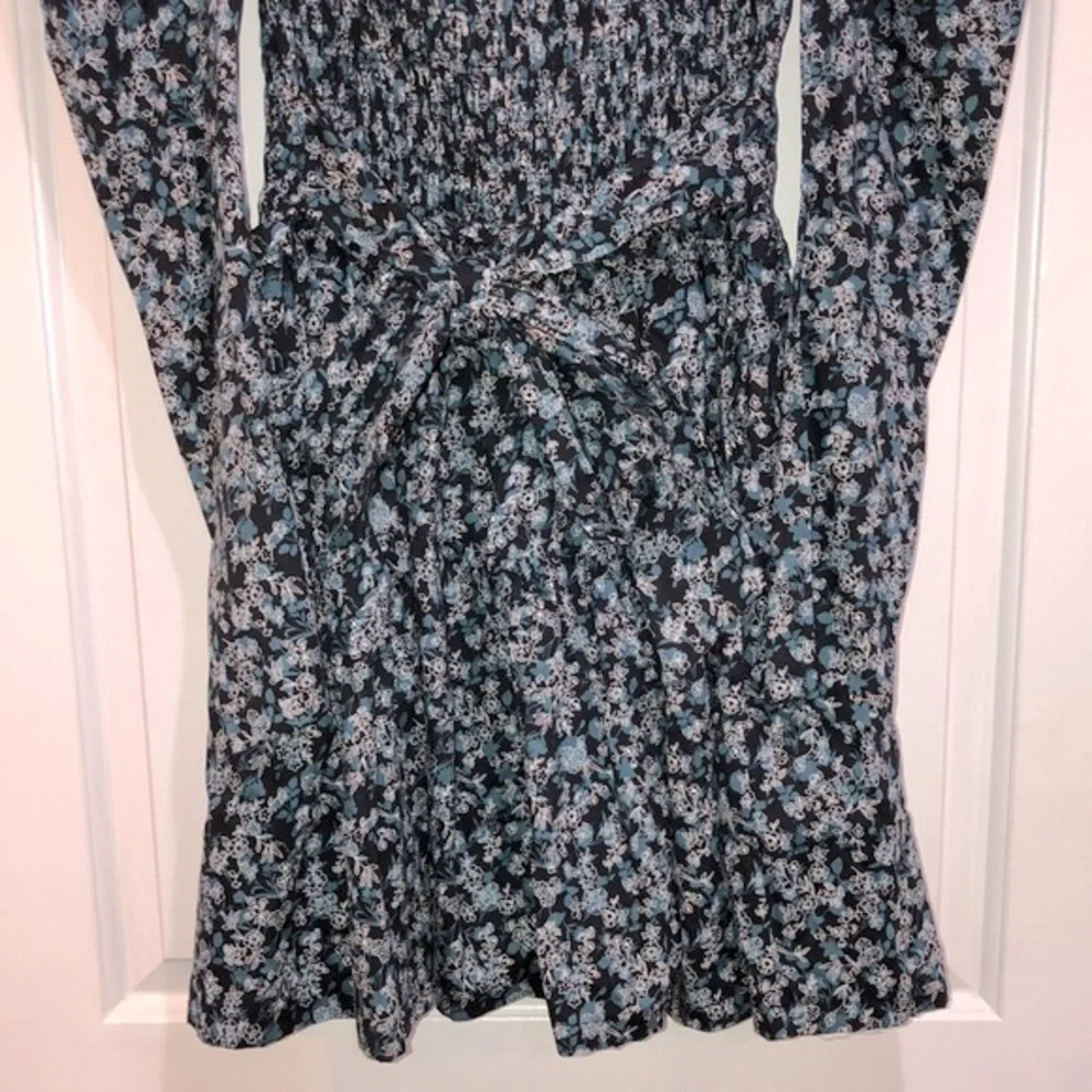 The Polly dress ditzy floral smocked boho dress size medium new with tags